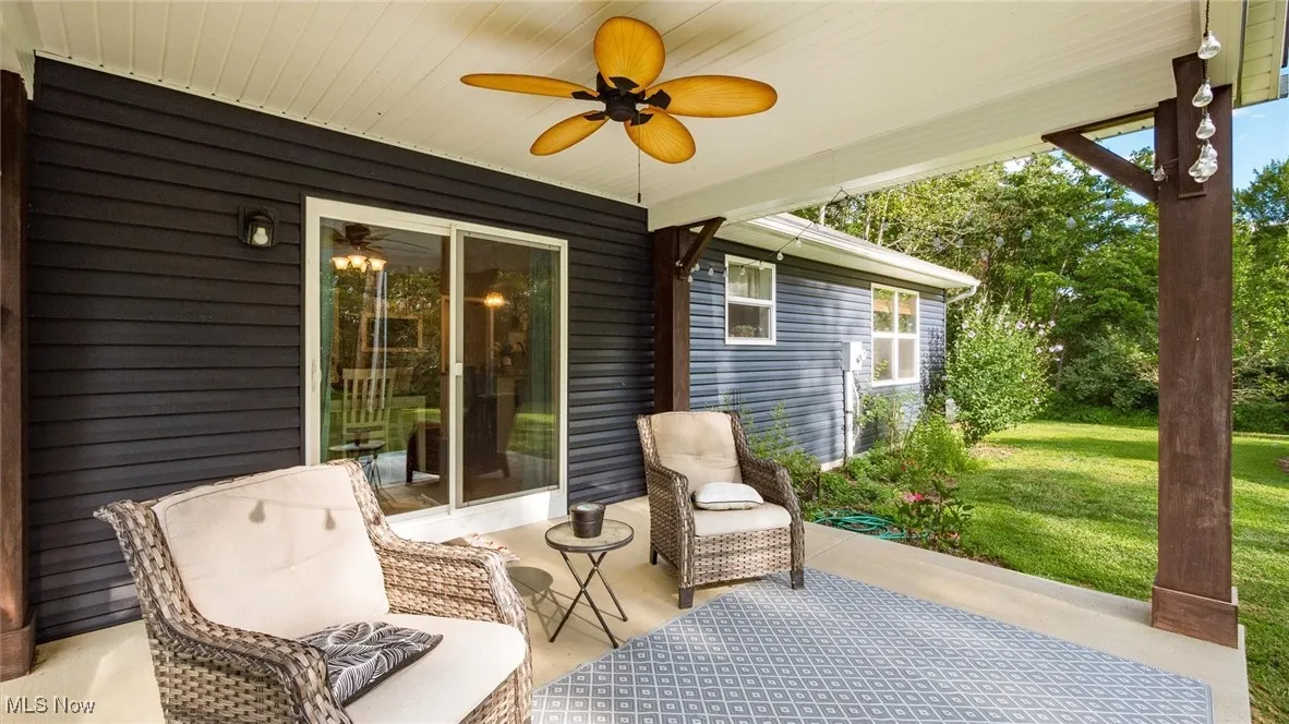 View of patio with ceiling fan