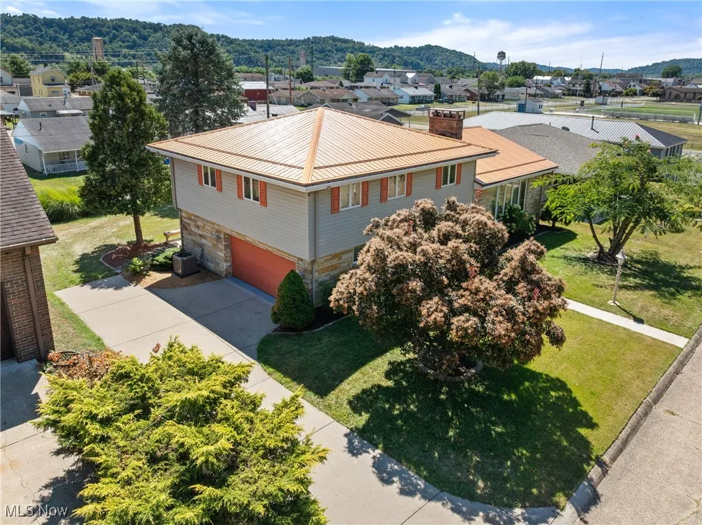 Aerial perspective of suburban area with a mountain backdrop