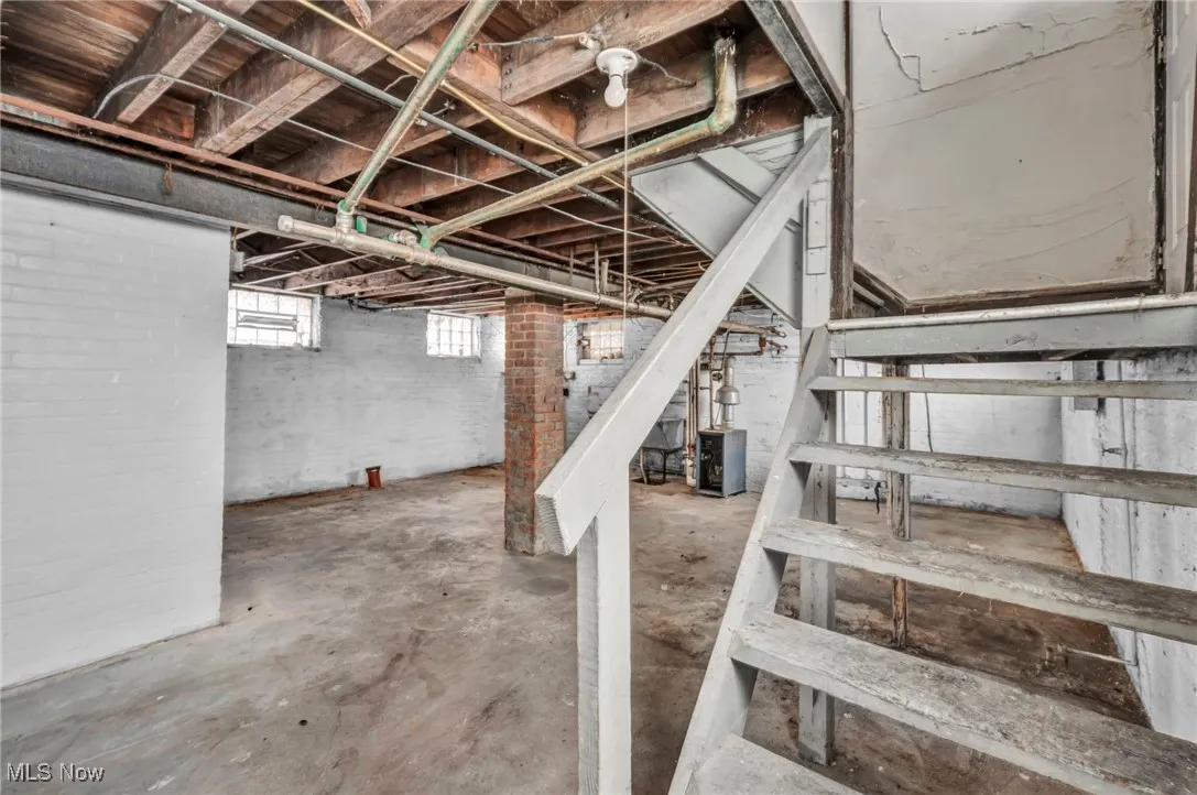 Basement featuring a heating unit