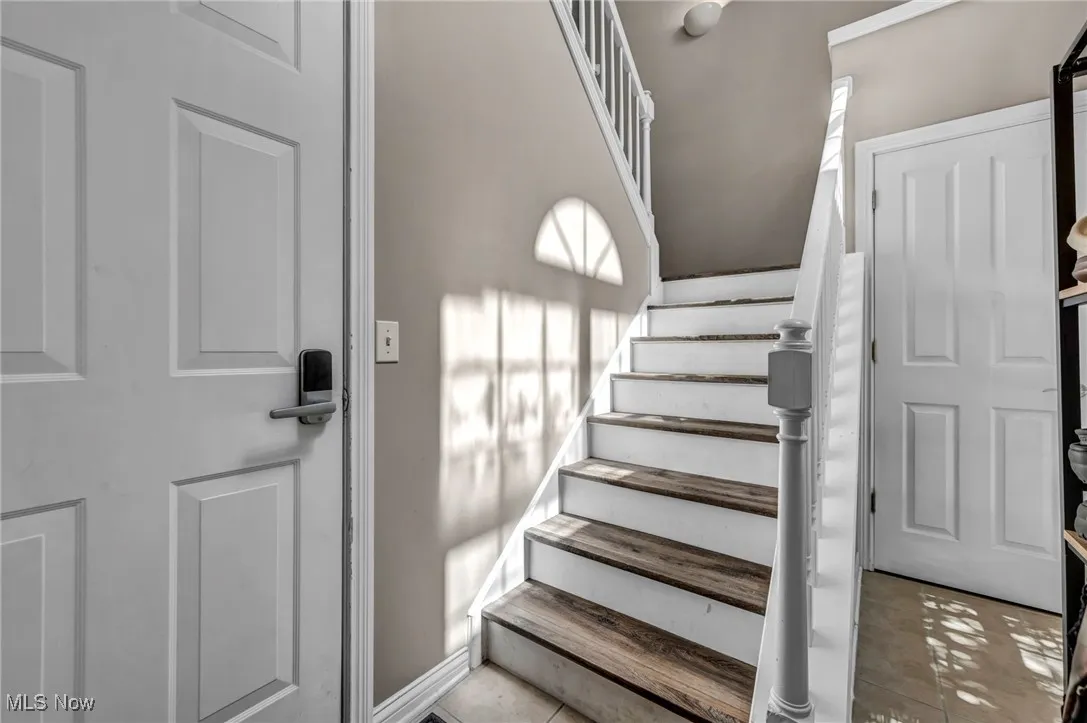 Stairway leading from front entry