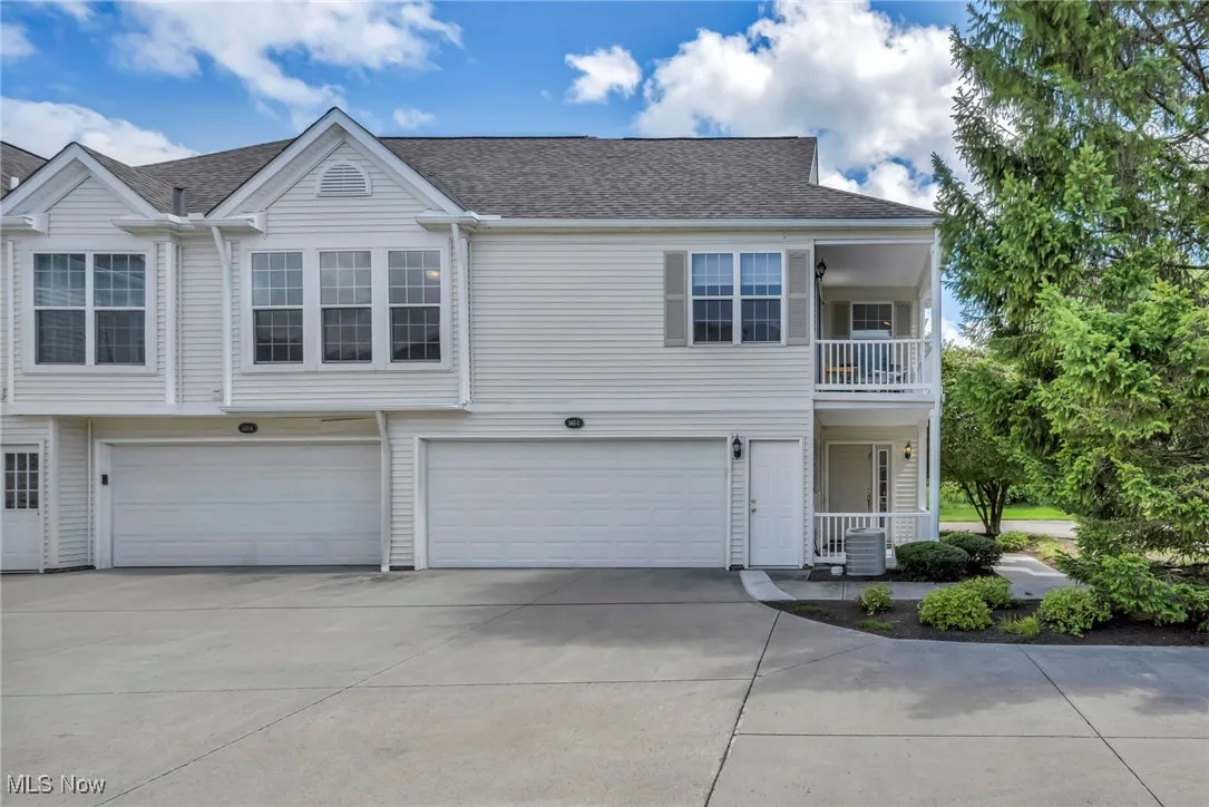 Front of home, with balcony