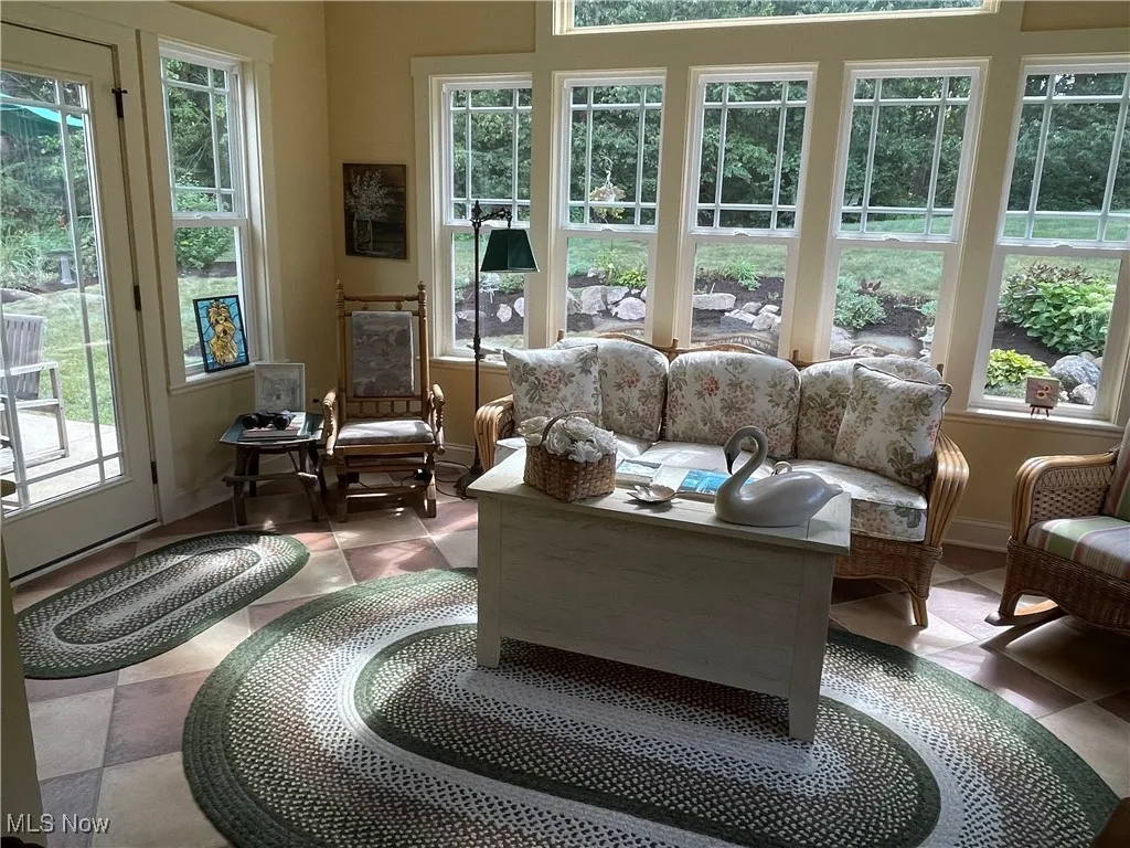 Sunroom featuring plenty of natural light