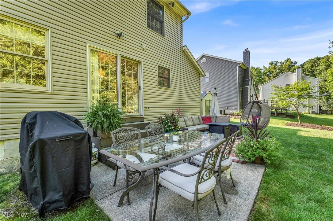 View of patio featuring a grill, outdoor lounge area, and outdoor dining area