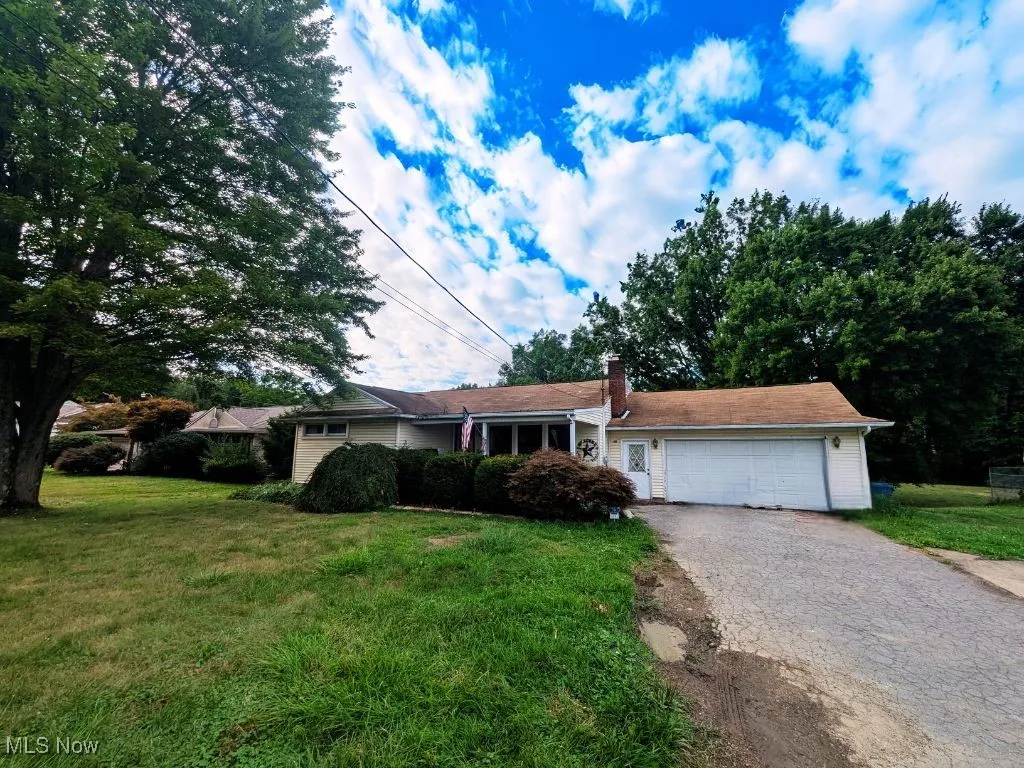 Ranch-style 3-bedroom 1-bathroom with an attached 2-car garage ready for your vision!