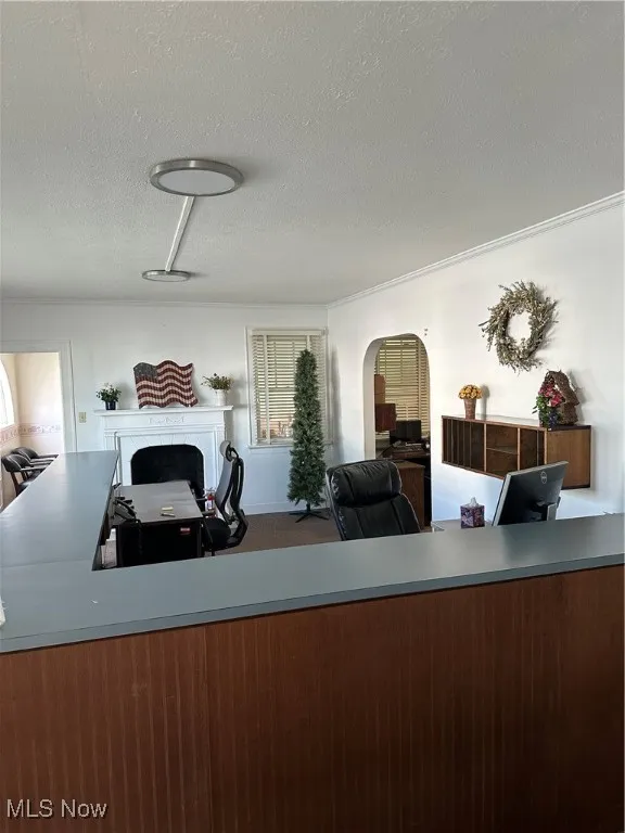 Reception/ lobby  area with a textured ceiling