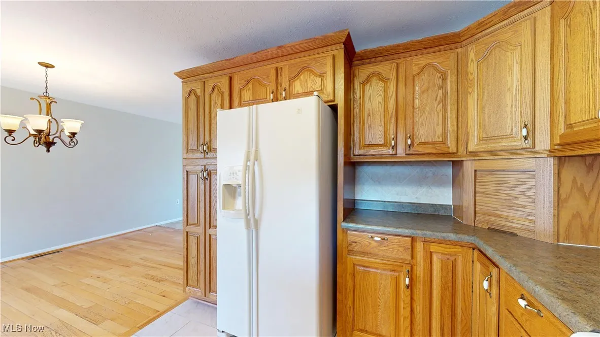 KITCHEN WITH OAK CABINETS