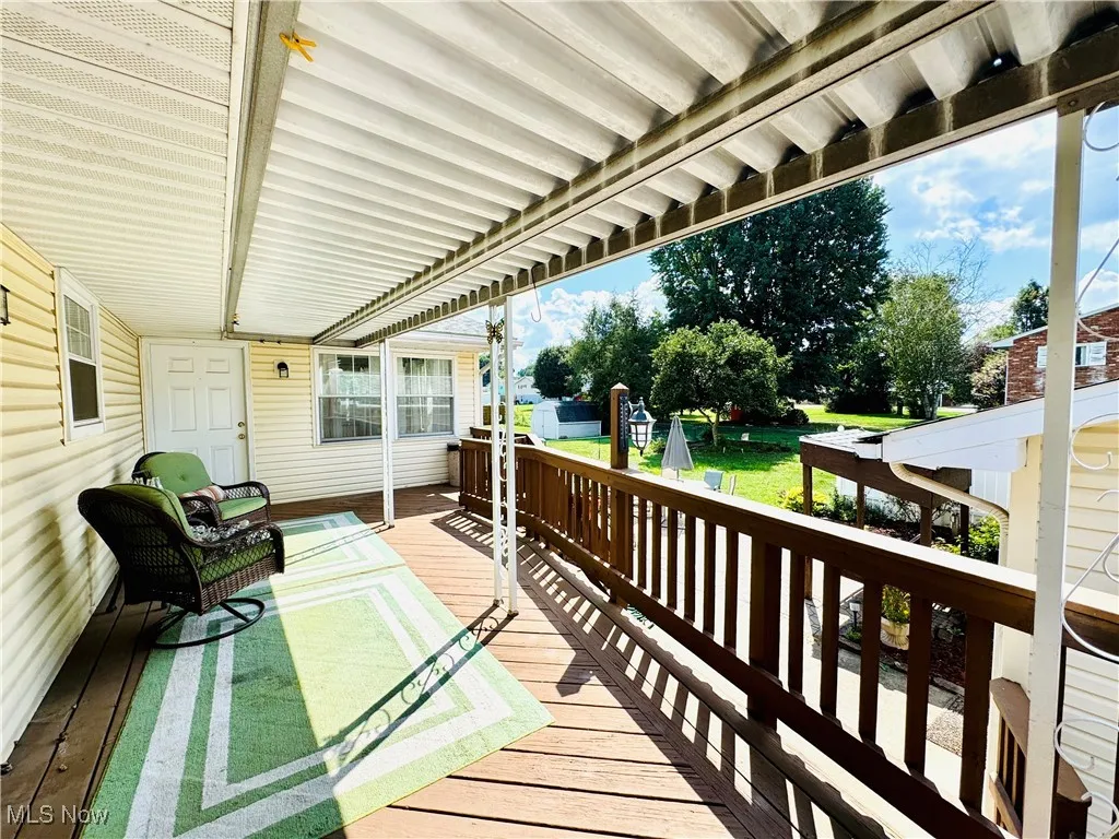 DECK OFF OF DINING ROOM AND EGRESS FROM MASTER BEDROOM AS WELL