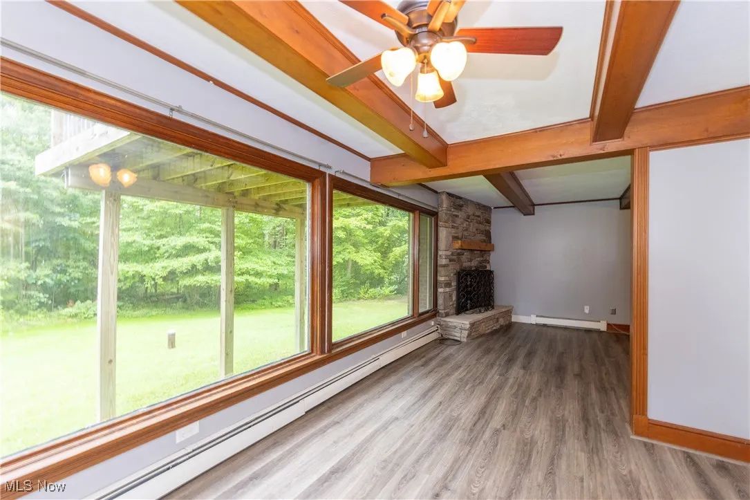 A wall of windows overlooking the backyard