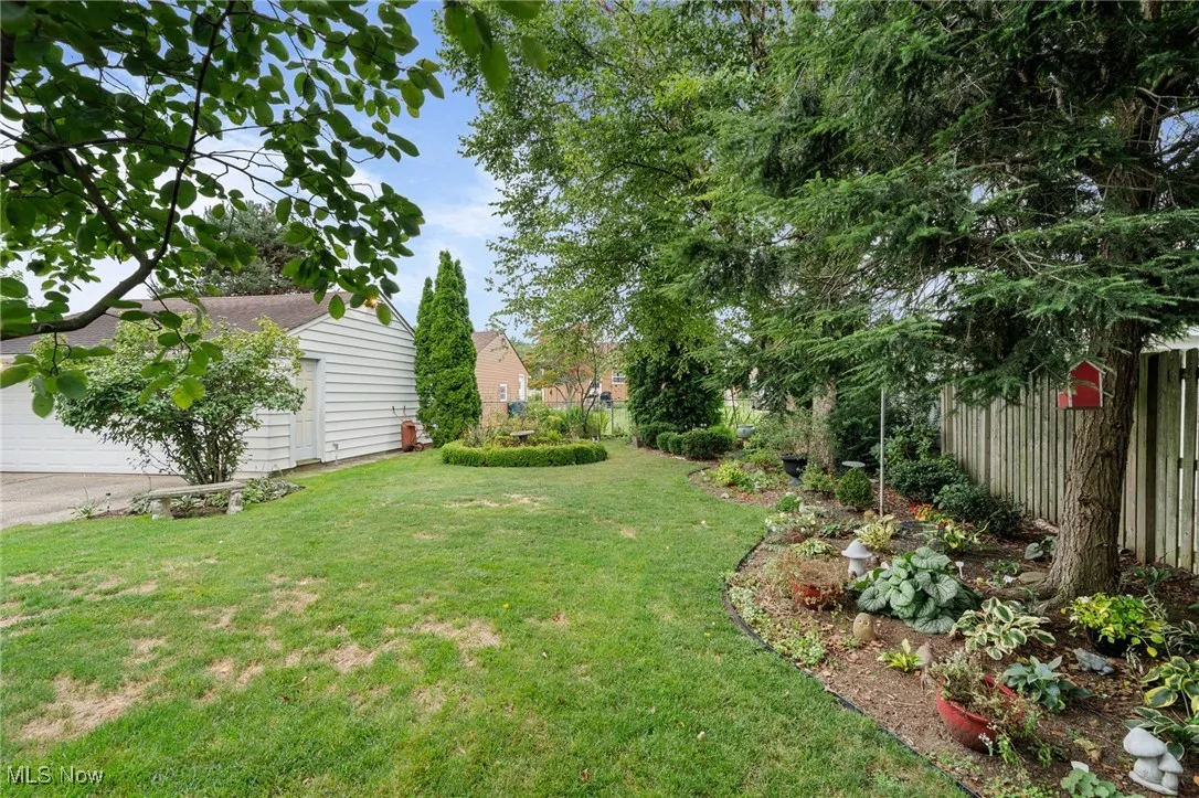 View of yard featuring a garage
