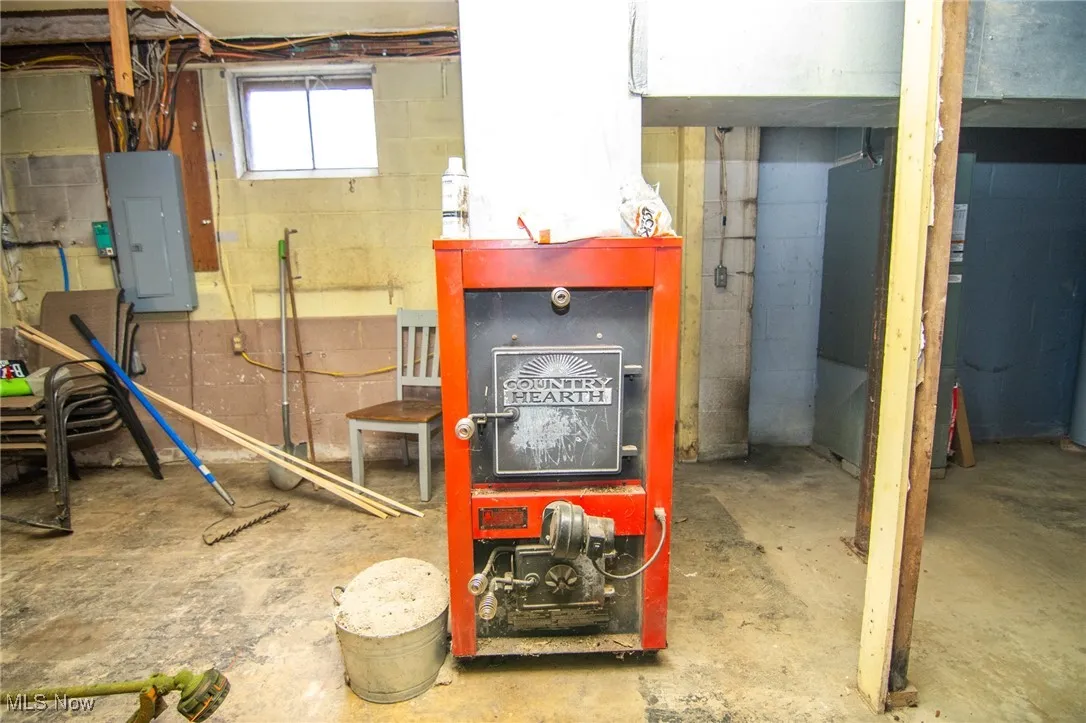 Basement featuring electric panel
