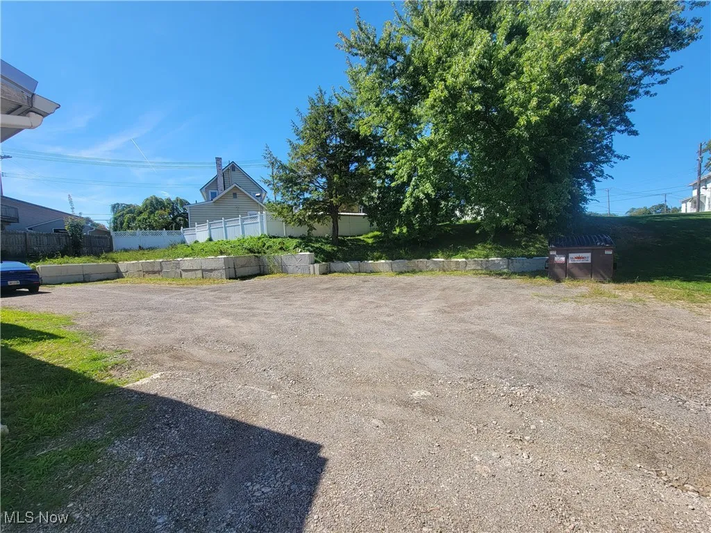 View of yard featuring driveway