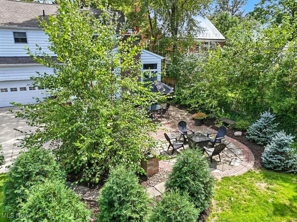 View of yard featuring an outdoor fire pit and a patio area