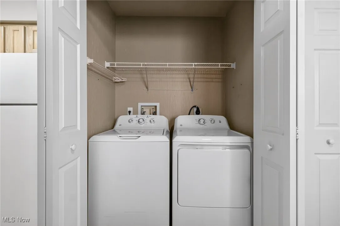 Laundry room with washer and dryer