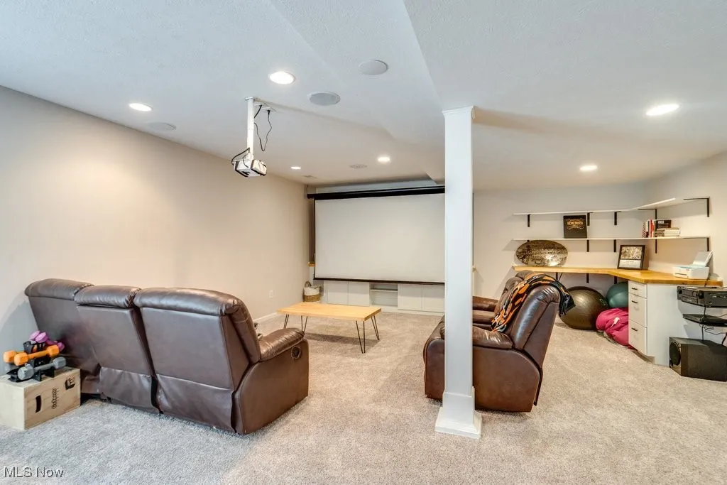 Cinema room featuring recessed lighting and carpet flooring