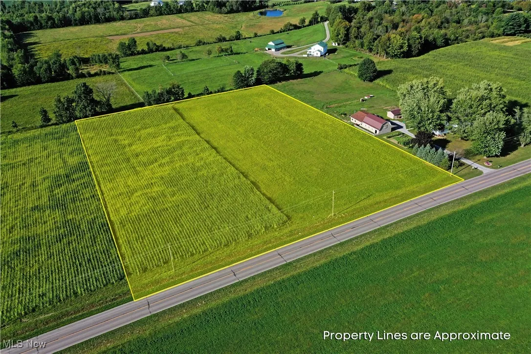 Overview of rural landscape with property boundaries highlighted and farmland