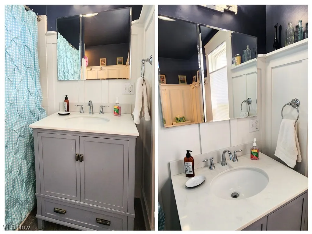 Bathroom featuring vanity and a shower with curtain