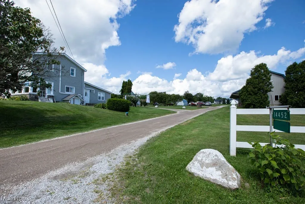 View of asphalt street with a residential view