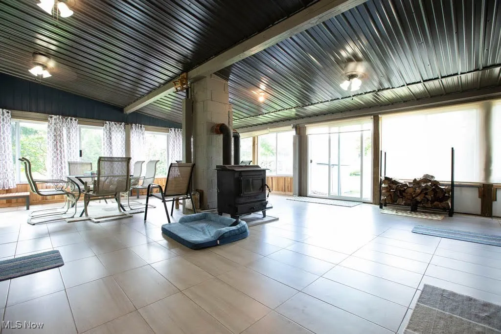 SUN ROOM WITH DUAL WOOD BURNING STOVES