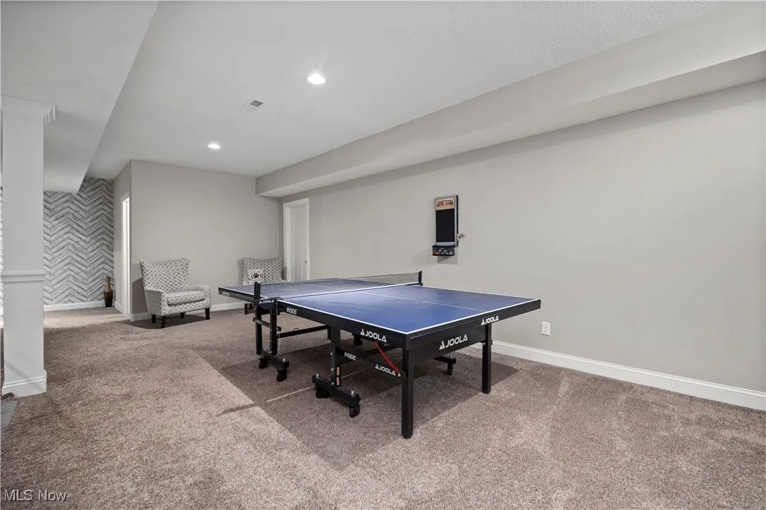 Playroom featuring light carpet and recessed lighting