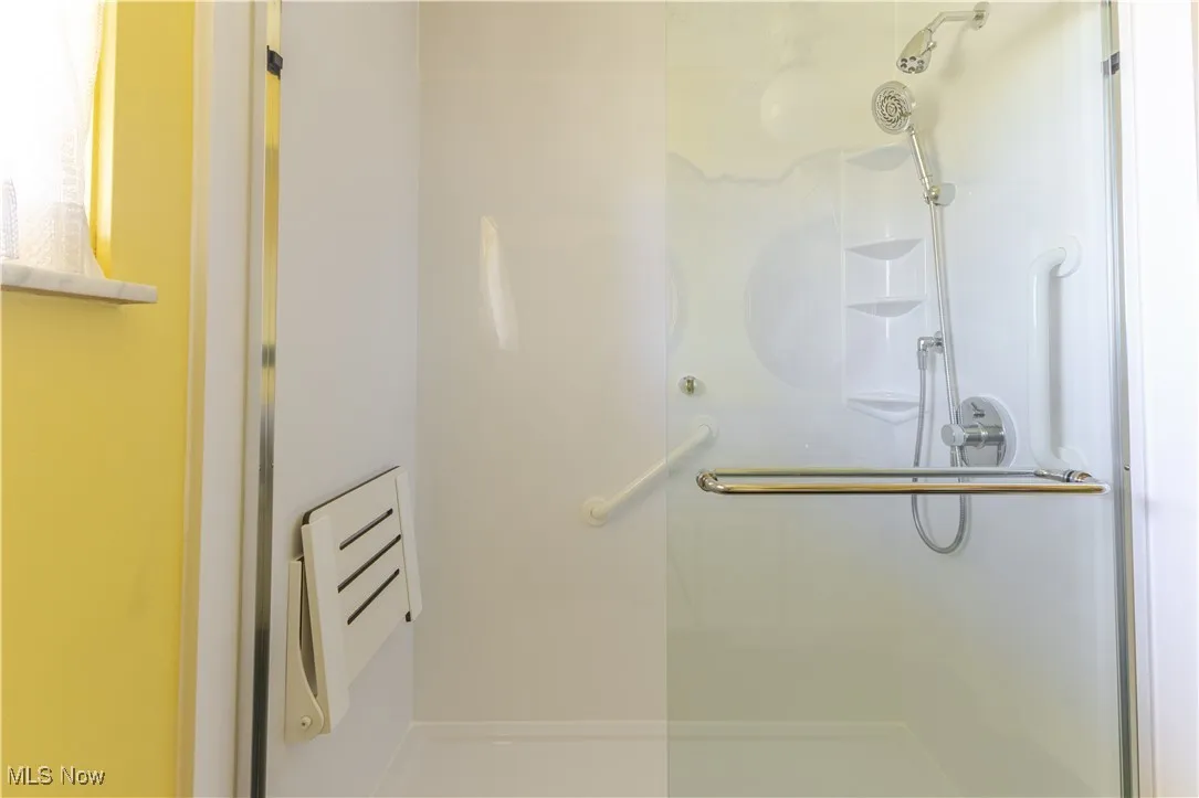 Bathroom with a stall shower
