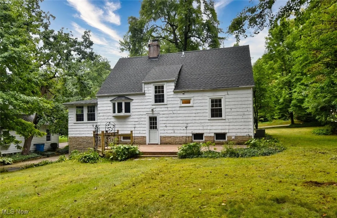 Back of property  with deck