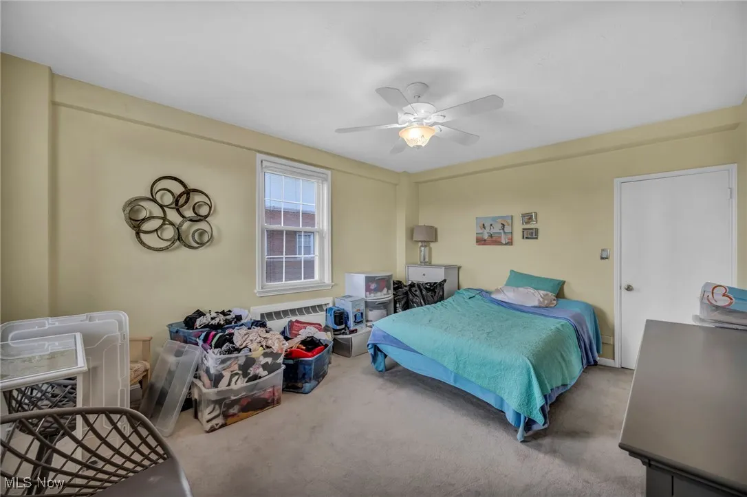 Bedroom featuring carpet flooring and ceiling fan