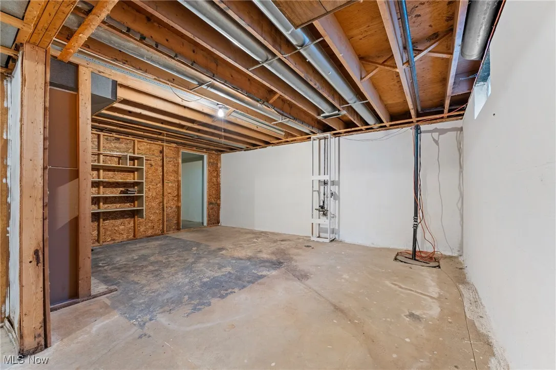 Unfinished basement with drainage system
