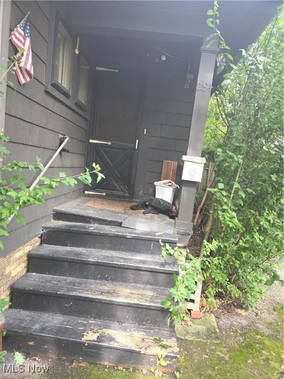 Property entrance with a​​‌​​​​‌​​‌‌​‌‌​​​‌‌​‌​‌​‌​​​‌​​ porch
