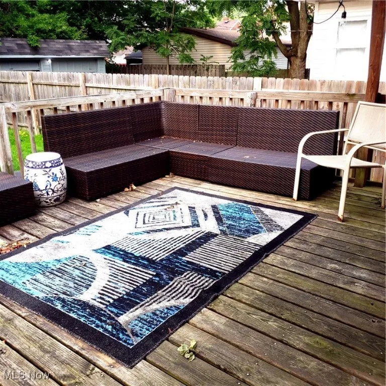 Deck with a fenced backyard