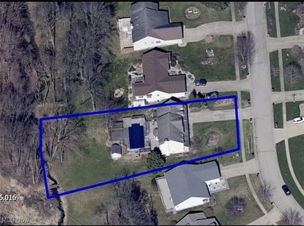Aerial overview of property's location with property parcel outlined