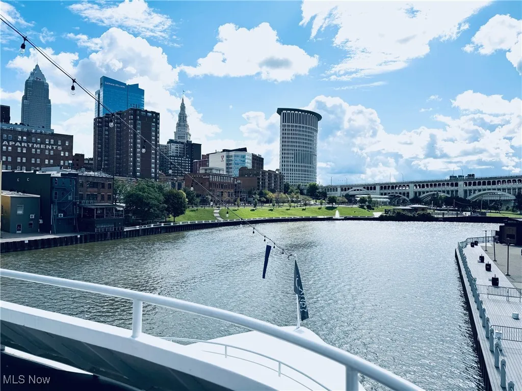 Water view featuring city skyline and a notable bridge
