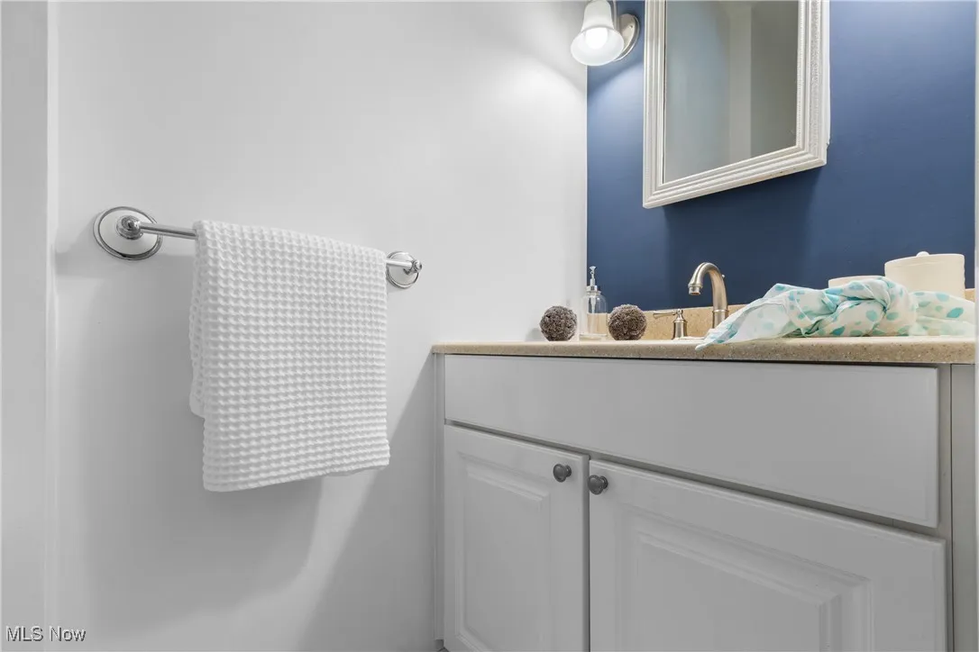 master 1/2 Bathroom featuring vanity