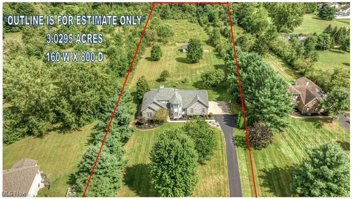 Aerial overview of property's location with property parcel outlined