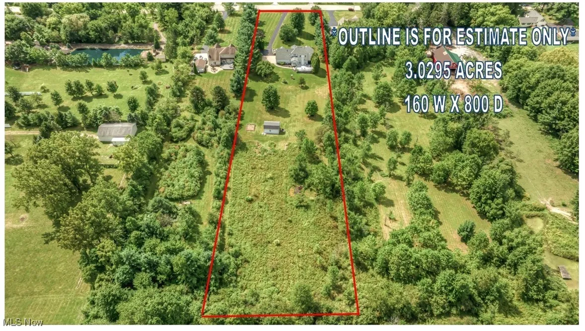 Aerial view of property's location featuring property parcel outlined