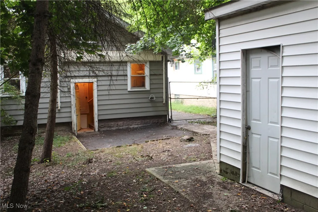 Rear view of house featuring a patio area
