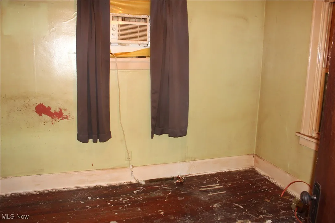 Primary bedroom with window/wall A/C