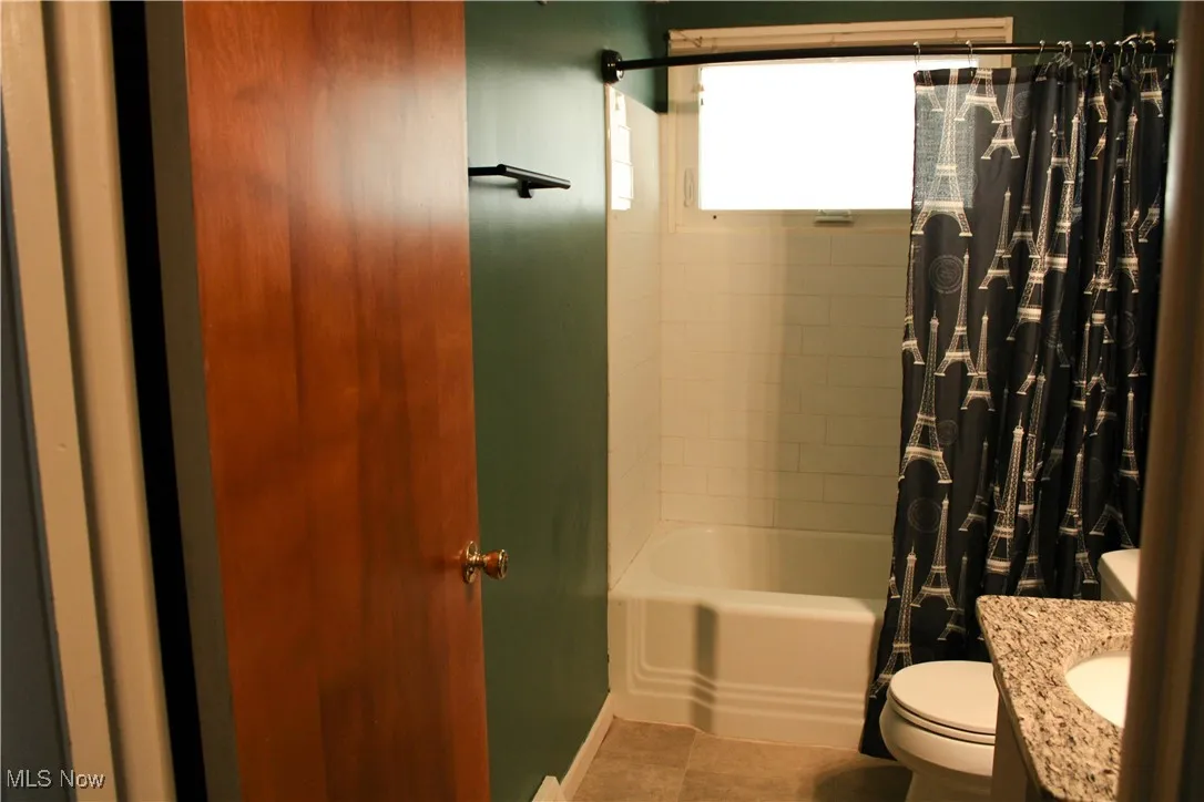 Bathroom featuring shower / bath combo