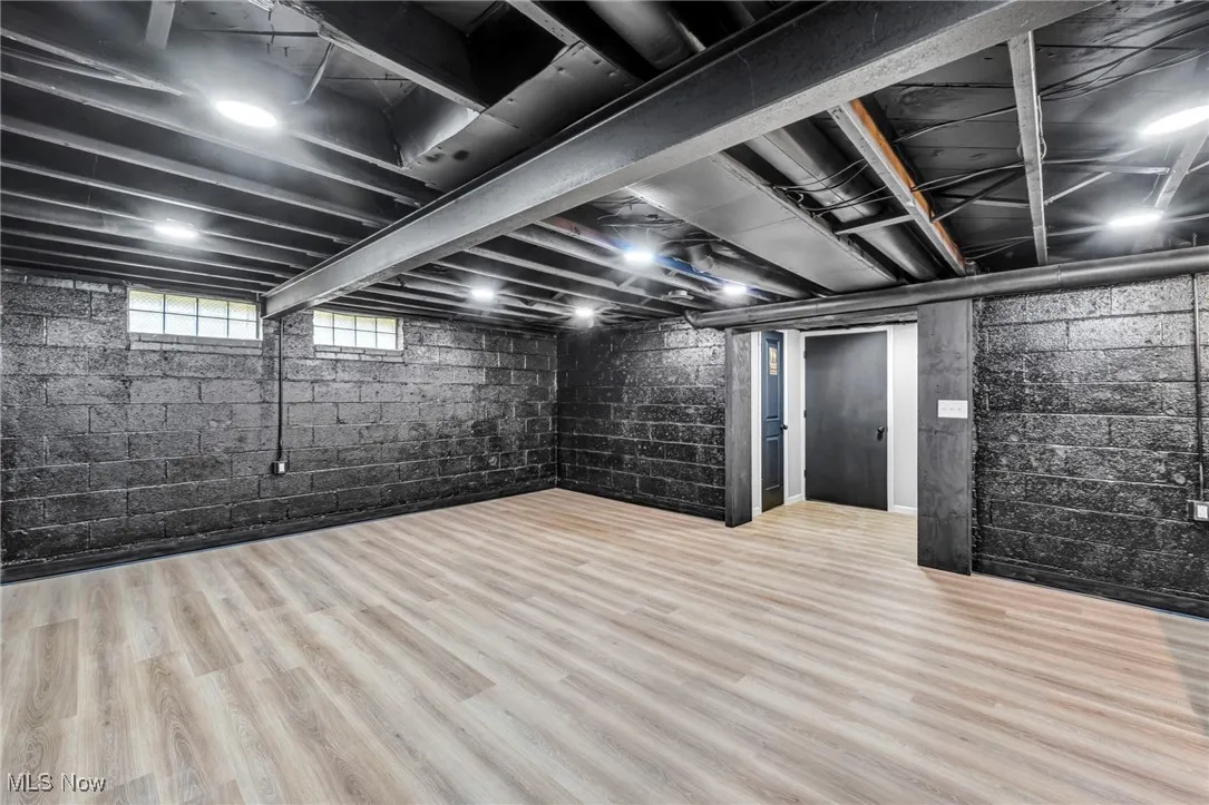 Below grade area with wood finished floors