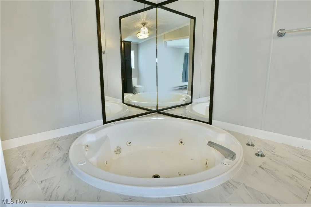 Bathroom featuring a whirlpool tub