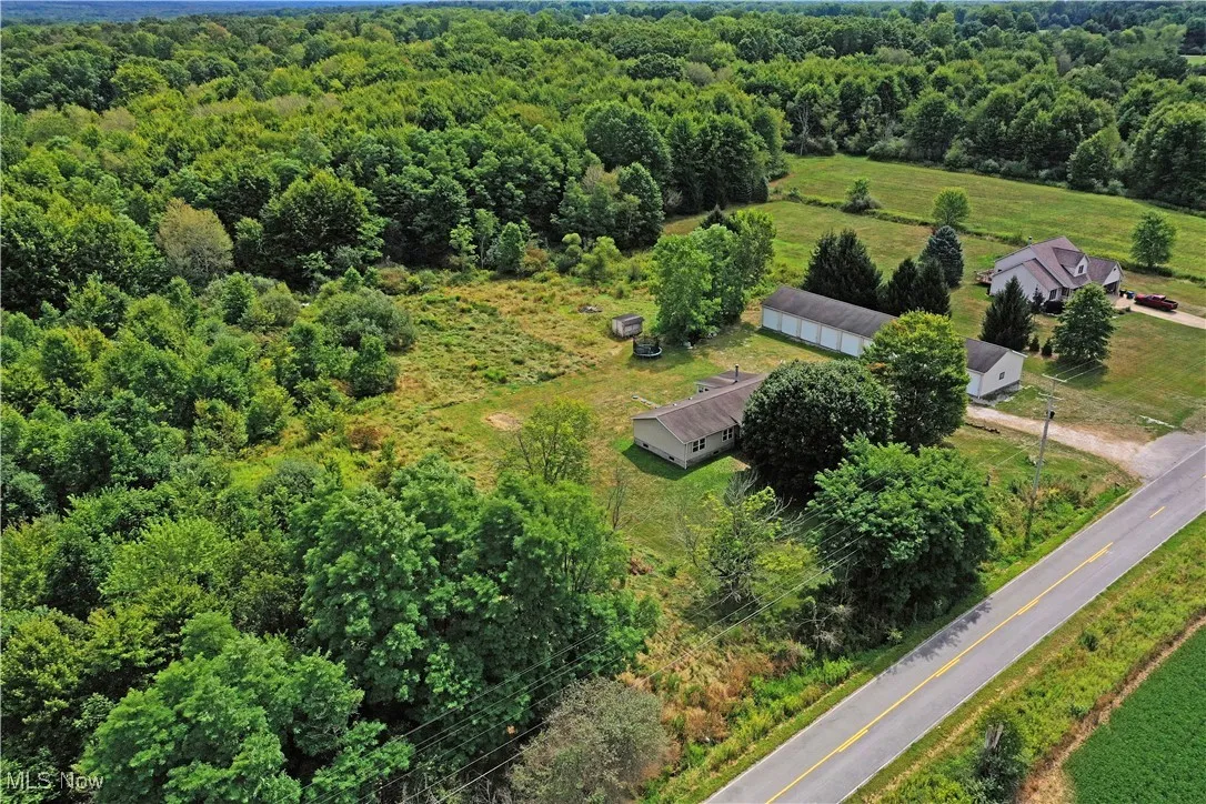 Drone / aerial view of a heavily wooded area