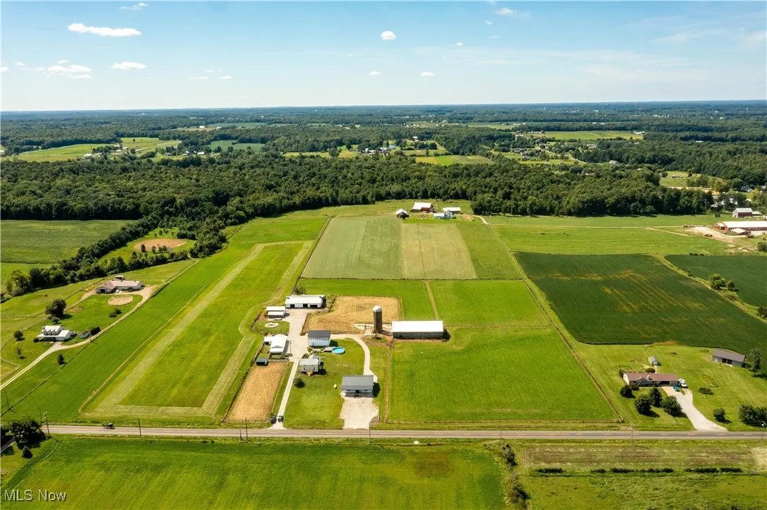 Aerial view of sparsely populated area with extensive farmland