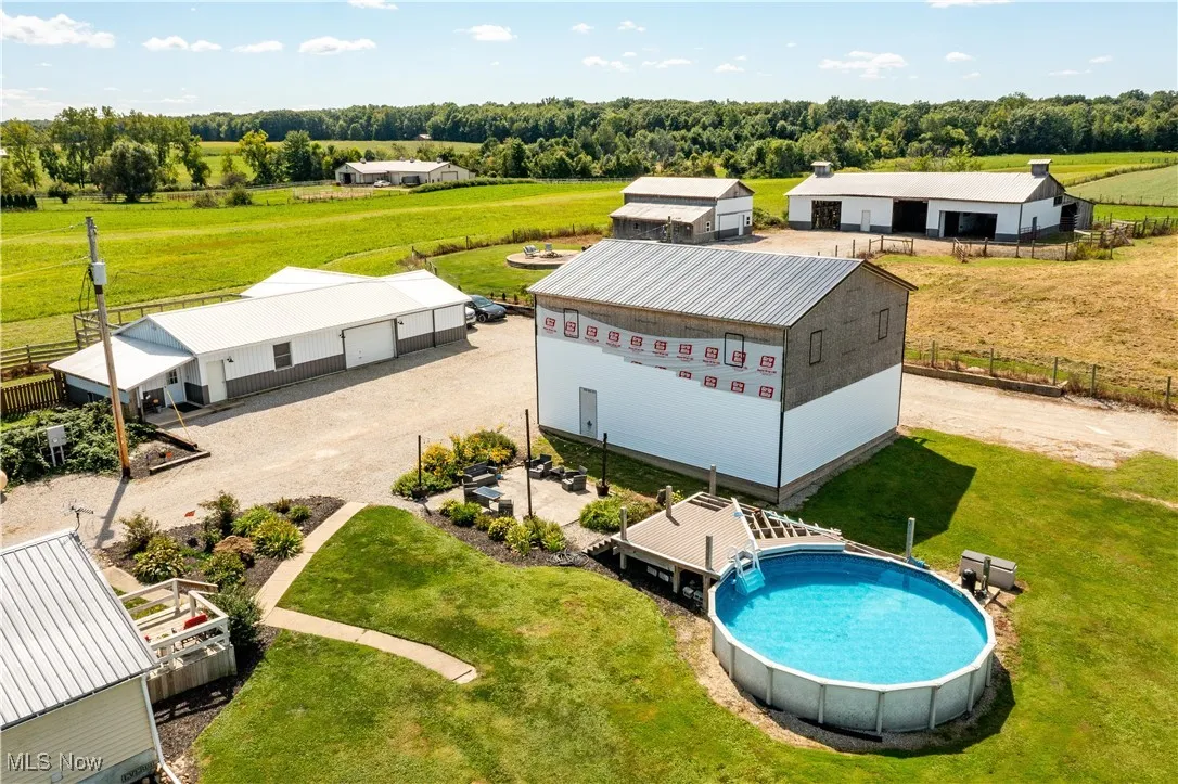 View of rural area with a pool