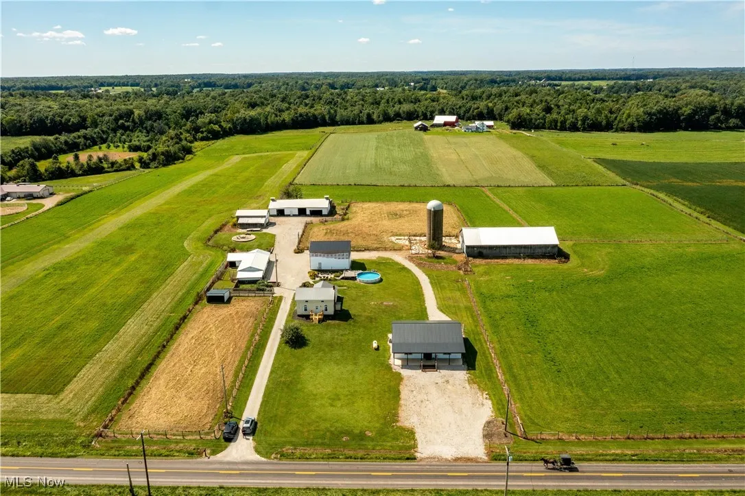 Aerial view of sparsely populated area with farmland