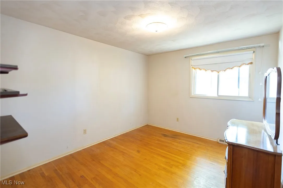Spare room with light wood-style floors