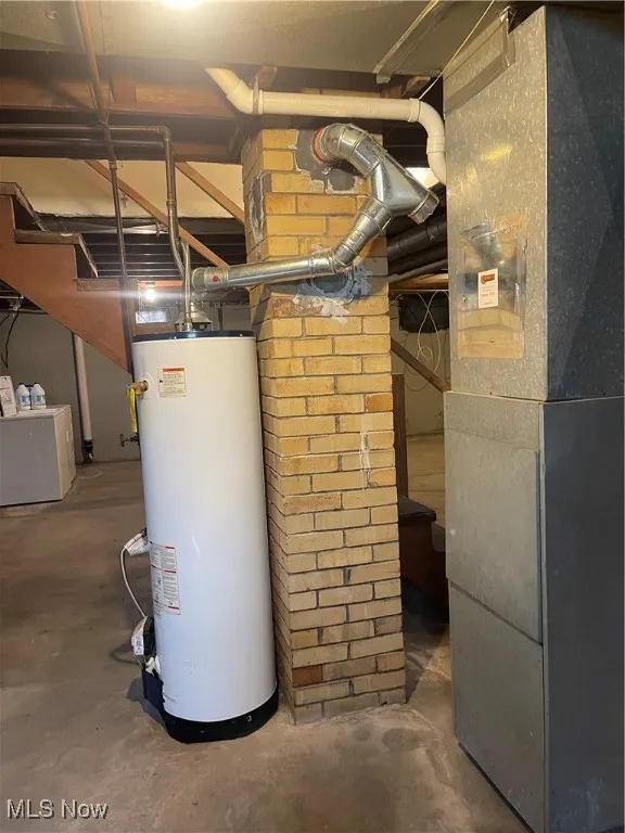 Utilities featuring gas water heater and heating unit