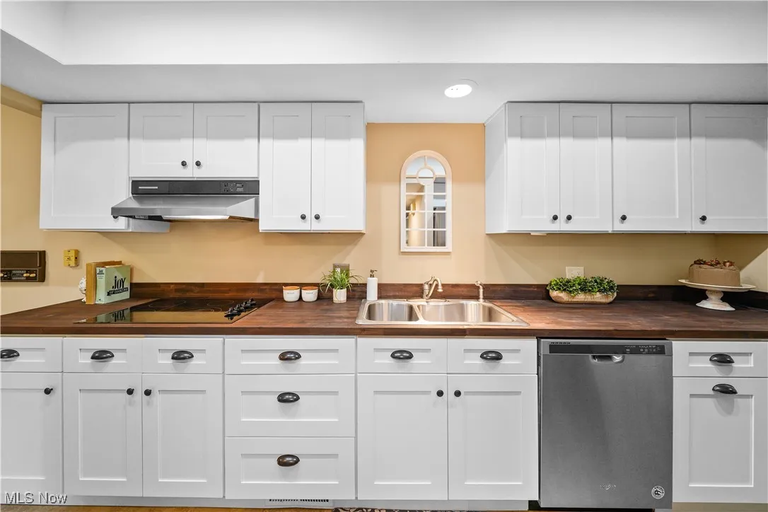Nicely updated kitchen with newer white cabinets, countertops and appliances.