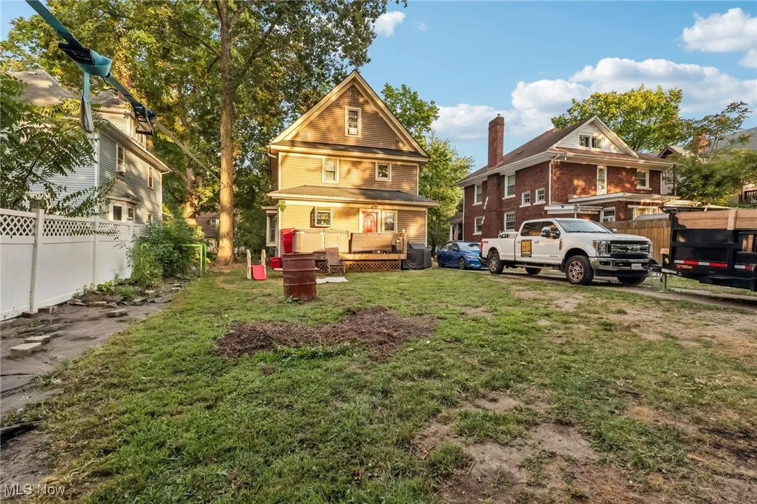 Rear view of house featuring a deck