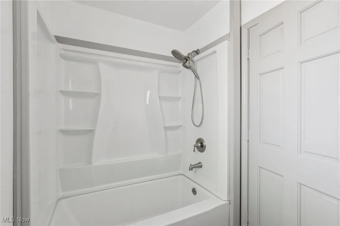 Bathroom with washtub / shower combination