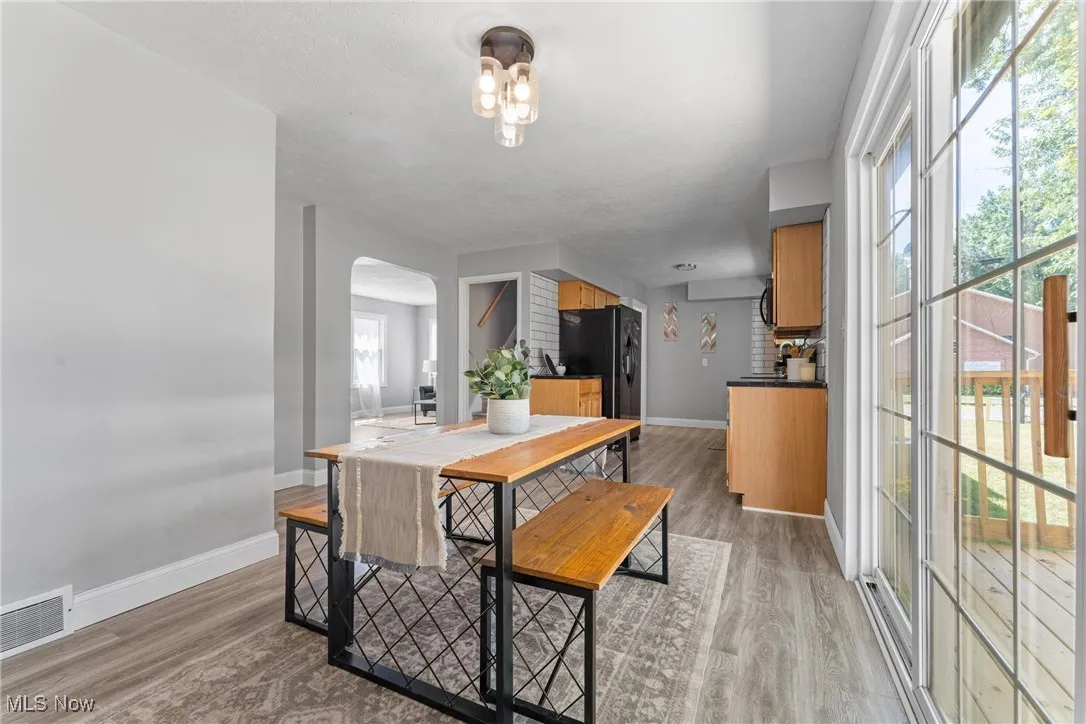 Dining room with light wood-style floors