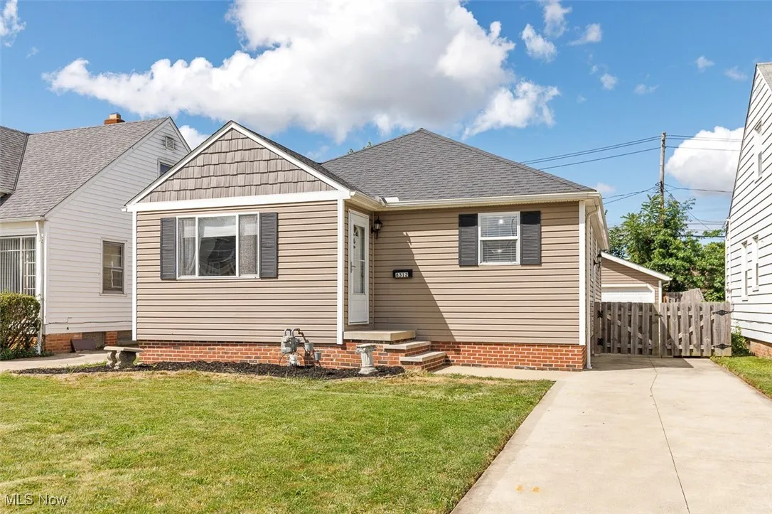 View of front of property featuring a shingled roof